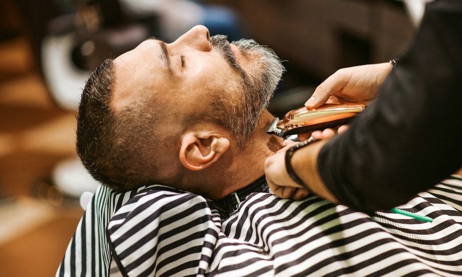 barber-trims-the-beard-of-the-customer.jpg